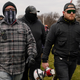 Proud Boys members Joseph Biggs, left, and Ethan Nordean, right with megaphone, walk toward the U.S. Capitol in Washington, in support of President Donald Trump.